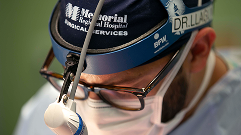 Dr. Omar Llaguna close up in surgery mask